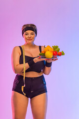 Wall Mural - Fat girl size plus model with vegetables and measuring tape.