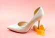 © Alexandr Milodan - A woman's shoe crushed a chicken egg. The concept of female dominance. Concept photo.