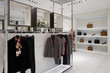 Women fashion clothing and accessories store display. Luxury and fashionable interior in shopping mall.