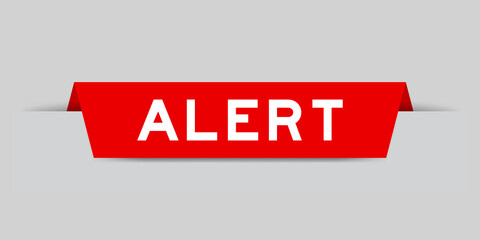 Sticker - Red color inserted label with word alert on gray background