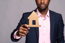 Realtor Housing Agent Concept, Man Holding A Cardboard House