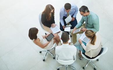 Aufkleber - Meeting of creatives. High angle shot of a group of businesspeople meeting in the office.