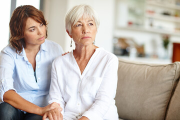 Wall Mural - Whats on your mind, Mom. Shot of a woman supporting her elderly mother through a difficult time.