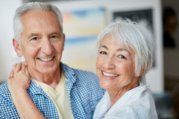 Wall Mural - The heart has no wrinkles. Portrait of a loving senior couple at home.