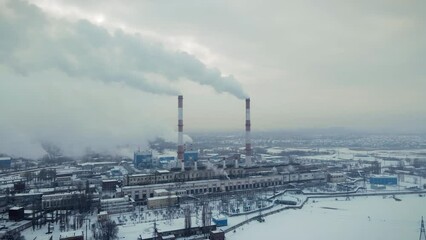 Wall Mural - Industrial Factory smokestack emissions, climate change and global warming for the environment concept. Aerial view