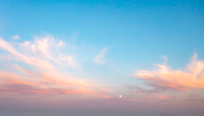Wall Mural - a beautiful sky painted by the sun leaving vibrant gold and pink hues. clouds in the twilight sky in