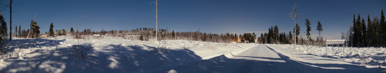 Wall Mural - night panorama of small swedish town and road in winter, the town name granbergsliden is written on 