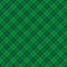 St. Patricks Day Dioganal Tartan Plaid. Scottish Pattern In Green And Dark Green Cage. Scottish Cage. Traditional Scottish Checkered Background. Seamless Fabric Texture. Vector Illustration