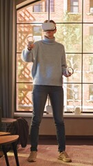Fototapete - Vertical Screen: Young Female Gamer with Short Hair Having Fun and Playing Virtual Reality Game at Home in Her Living Room. She is Wearing a Modern Headset and Using Controllers.