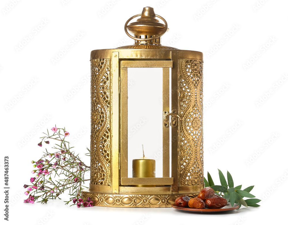 Muslim lantern, dates and flowers on white background