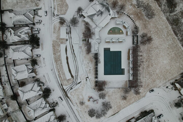 Sticker - An aerial shot of a neighborhood covered in the snow in Paloma Creek, Texas