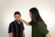 © Antonio Tanaka - married couple fighting on a white background