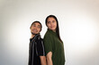 © Antonio Tanaka - young Hispanic heterosexual couple happy and smiling on a white background