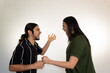 © Antonio Tanaka - married couple fighting and screaming on a white background