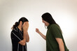 © Antonio Tanaka - married couple fighting and screaming on a white background