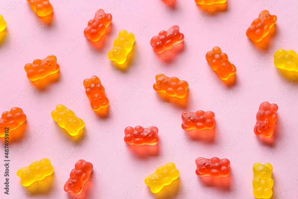 Sweet jelly bears on pink background