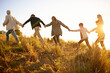 © Mariusz S/peopleimages.com - Safe in each others hands. Shot of a happy family holding hands on a morning walk together.