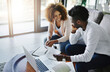 © Delmaine D/peopleimages.com - Weve managed our budget so well this month. Shot of a young couple going through their paperwork together at home.