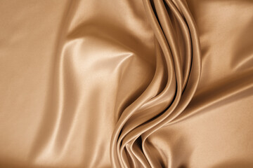 Wall Mural - Beautiful elegant wavy beige satin silk luxury cloth fabric with monochrome background design. 