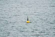 North Cardinal Buoy At Sea Marking An Underwater Obstacle To Passing Ships. 