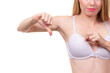 Woman dissatisfied with size of bra breasts