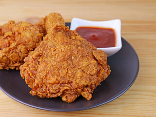 Closeup of Delectable Golden Brown Crispy Crunchy Fried Chickens with Dip