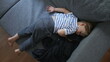 © Marco - Child napping on couch in the afternoon