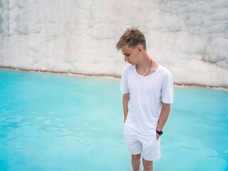 Handsome teenager guy 15 -18 years old in a hot spring in Pamukkale, Turkey