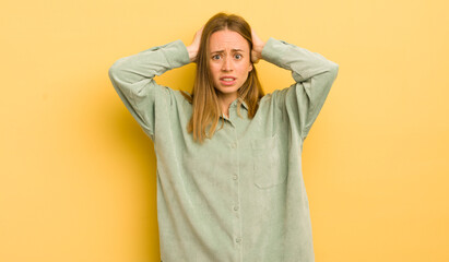 Poster - pretty caucasian woman feeling stressed, worried, anxious or scared, with hands on head, panicking at mistake