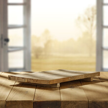 Wooden Desk Of Free Space And Window Background Of Spring. 