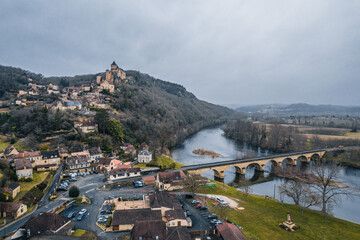 Wall Mural - Aerial view of an ancient medieval French village and Castelnaud-la-Chapelle Castle on the mountain in France