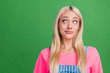 Sticker - Photo of dreamy inspired lady look empty space think thoughts wear striped overall isolated green color background