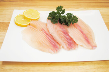 Wall Mural - Organic White Fish with Lemon & Parsley	