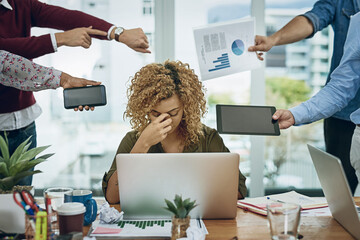 Poster - Work commitments are closing in on her. Shot of a young businesswoman looking stressed out in a demanding office environment.