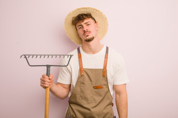 Wall Mural - young caucasian man. farmer concept