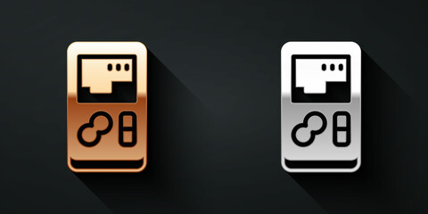 Poster - Gold and silver Portable video game console icon isolated on black background. Handheld console gaming. Long shadow style. Vector