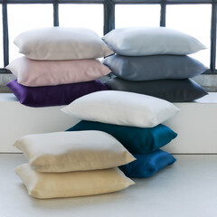 stack of silk pillows