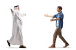 © Ljupco Smokovski - Full length profile shot of an arab man walking with open arms towards a young man
