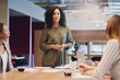 © Adene Sanchez/peopleimages.com - Thats an interesting point.... Low angle shot of an attractive young businesswoman addressing her colleagues during a meeting in the boardroom.