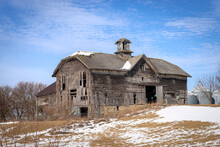 Old Wooden Barn Build In 1882 On A Sunny But Cold Winter Day.  LaSalle County, Illinois, USA.
