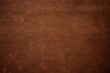 © dmitr1ch - dark brown natural leather texture. vintage background