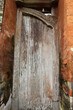 Entrance of Taman Ayun made of bricks and wooden door. Taken January 2022.