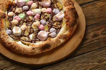 Wall Mural - Whole sweet pizza served with marshmallows and candies