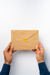 Poster - Male hands holding an envelope with a wax seal