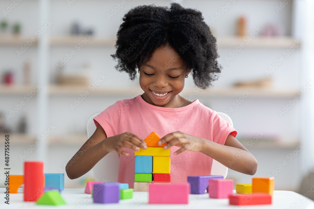 Little child playing with colorful wooden blocks Stock Photo | Adobe Stock