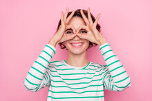 Portrait Of Attractive Cheerful Girl Showing Double Ok-sign Binocular Watch Cinema Isolated Over Pink Pastel Color Background