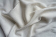Draped white cotton and polyester ribbed fabric