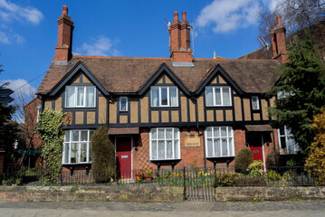 Sticker - England UK. Traditional houses and cottages in an English Village. Suitable for articles on housing market, finance, mortgage, cost of living etc. Generic property image.