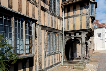 Sticker - England UK. Traditional houses and cottages in an English Village. Suitable for articles on housing market, finance, mortgage, cost of living etc. Generic property image.