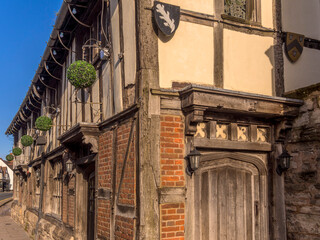 Sticker - England UK. Traditional houses and cottages in an English Village. Suitable for articles on housing market, finance, mortgage, cost of living etc. Generic property image.